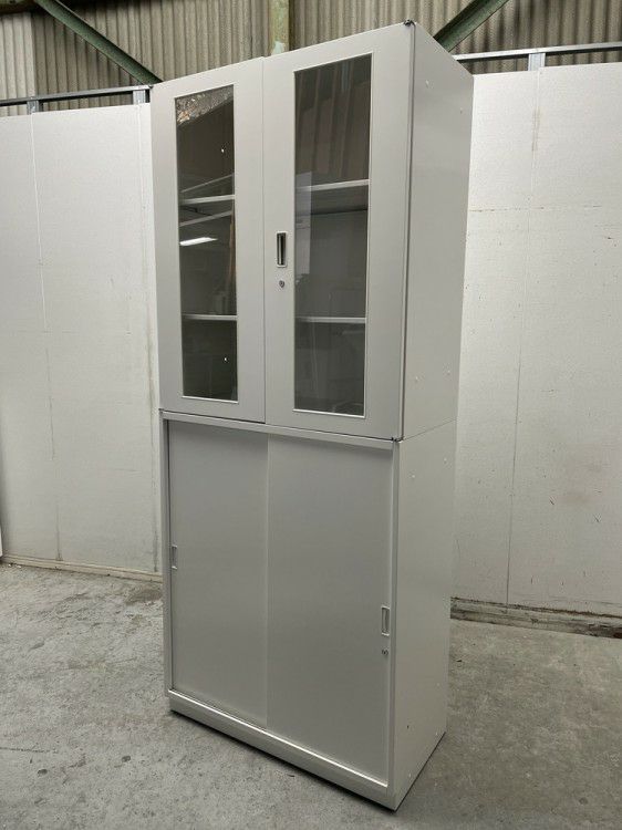 イトーキシンラインシリーズ ガラス両開きスライド上下書庫 商品画像1